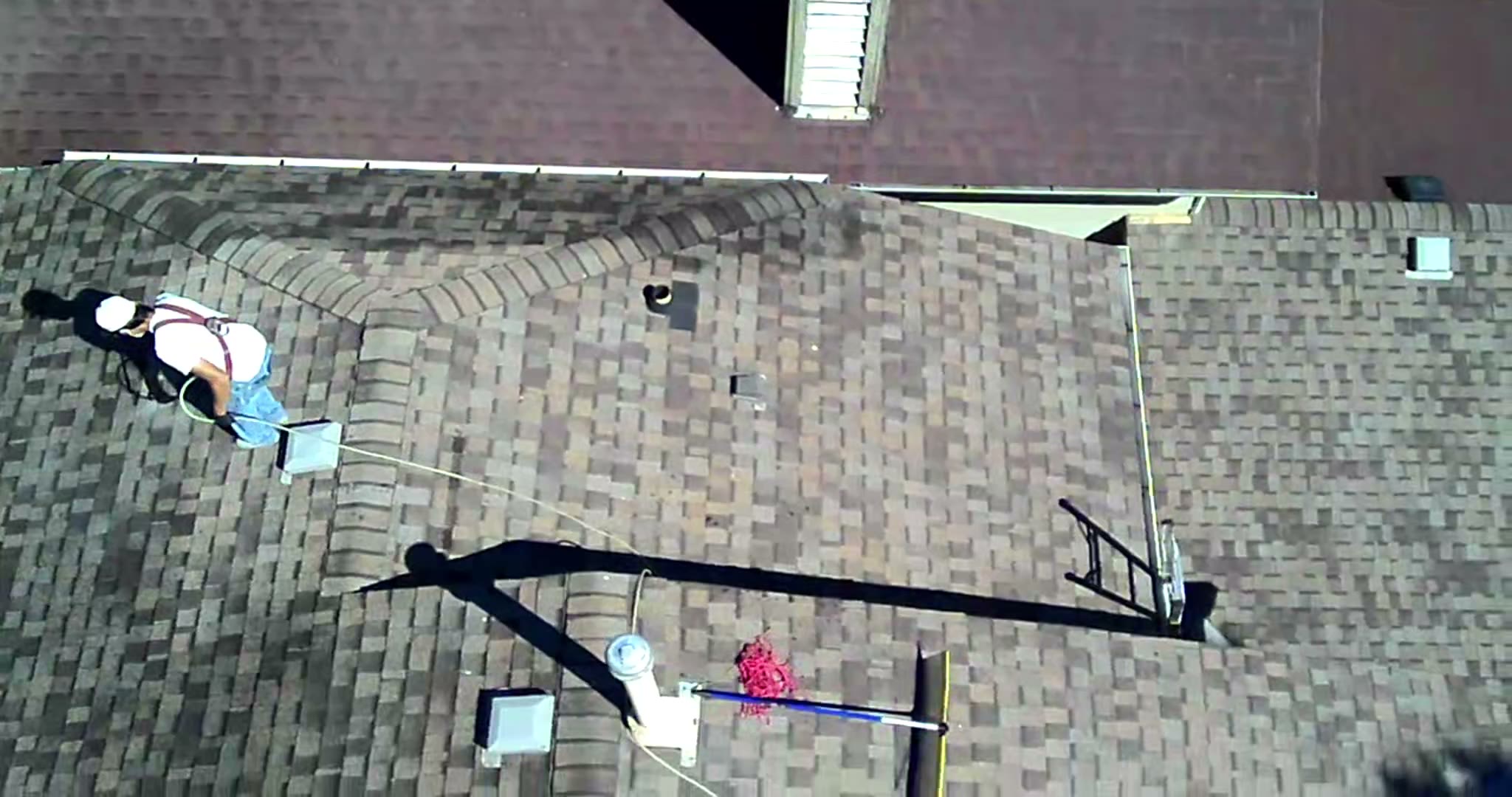 Drone view of an asphalt shingle roof on a Calgary home