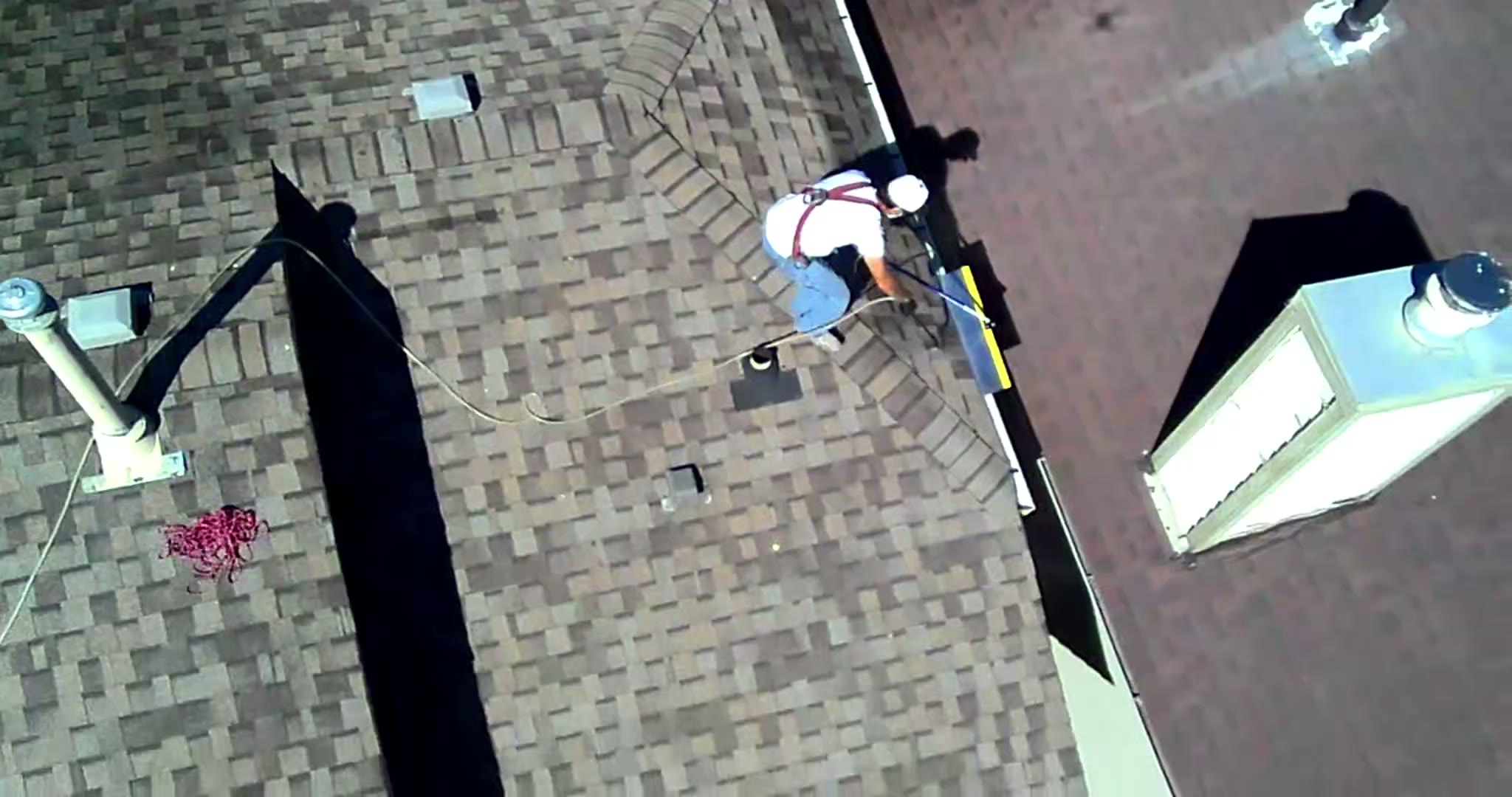Nano Shield crew member at work on a Calgary roof
